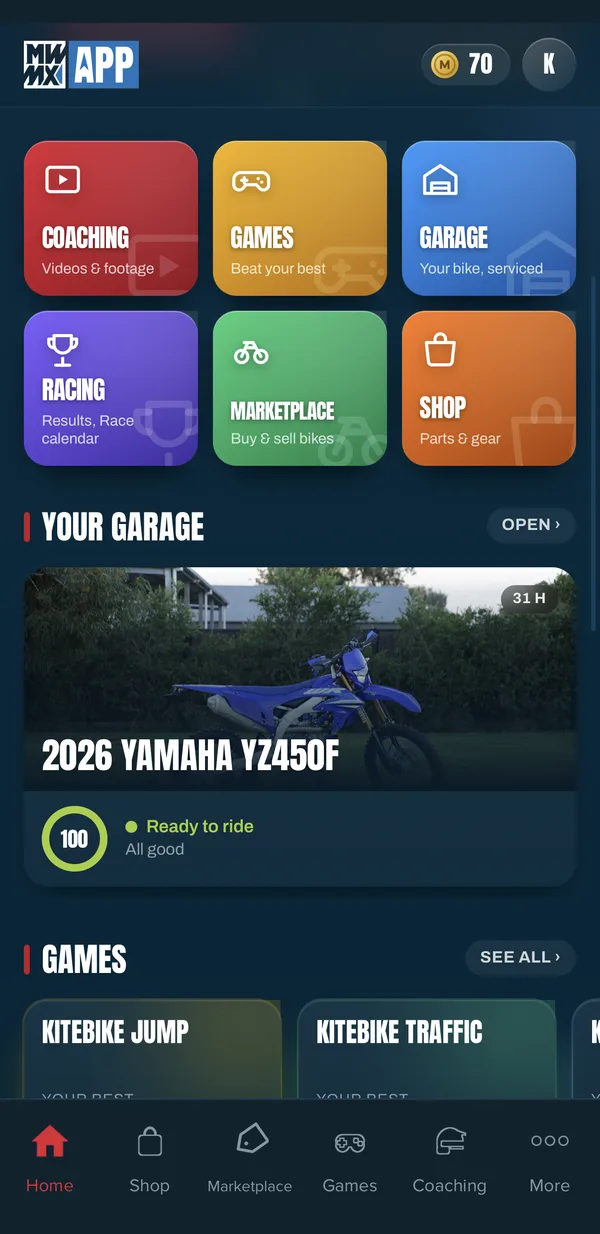 MWMX app home tiles: Coaching, Games, Garage, Racing, Marketplace, Shop