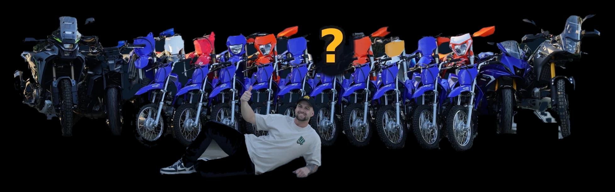Kale lying in front of the 25 MWMX giveaway bikes, with the mystery bike blacked out