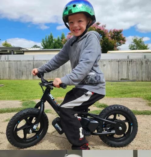 Kid on a Stacyc balance bike